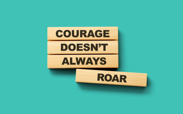 istock Wooden blocks Courage doesn't always roar word 3d illustration 1496872035