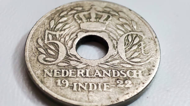 istock Old coins with a hole in the middle 1496875159