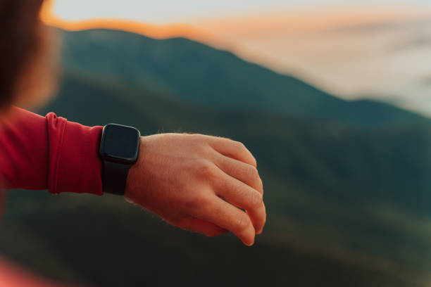 istock Man Using A Digital Smartwatch During Workout. Closeup View Of Man's Hands Checking An App In Smartwatch. Close-up Of A Clock That Shows Steps, Kilometers And bpm. 1496875930