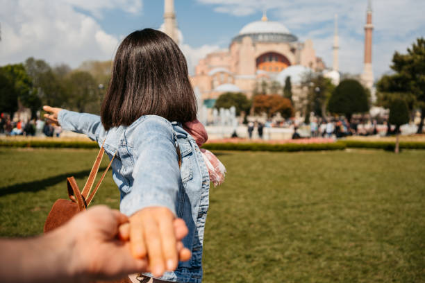 istock Follow-Me Concept In Front Of Hagia Sofia In Istanbul 1496876041