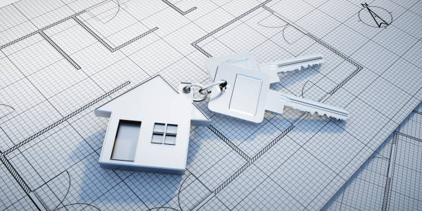 istock Keys with toy house and architectural plans 1496876411