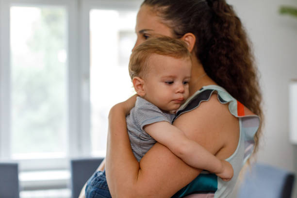istock Mother Comforting Her Baby Boy 1496877399