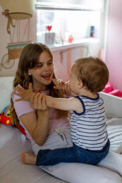 istock Brother And Sister Playing 1496877615