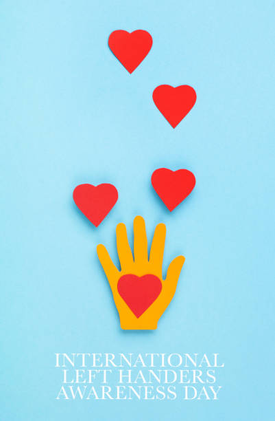 istock International Left Handers Day Concept on Blue Background 1496879880