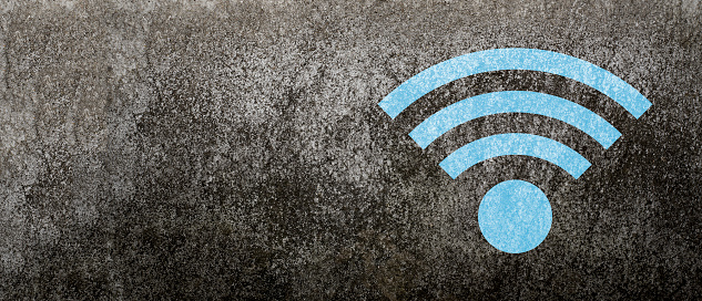 Wifi icon on old cement wall background