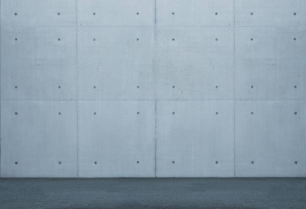 istock perfect concret wall outside on a sunny day with sun spots 1496886515