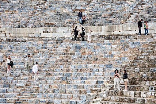 Ephesus, Turkey - 23 April: Tourists visiting the theater of Ephesus (Efes), Turkey.