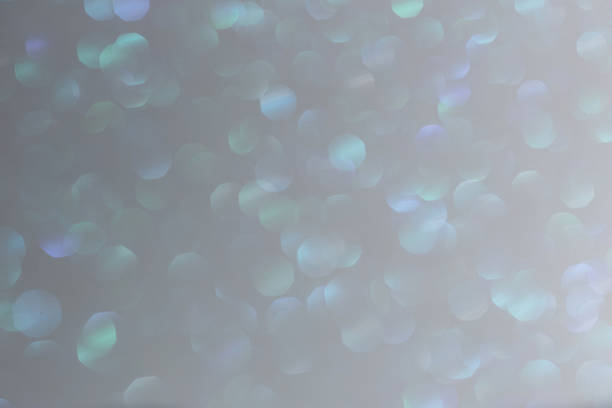 istock Silver glittering background for design and free space. 1496887712