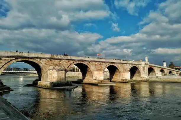 An iconic stone bridge over the Vardar River in Skopje, Macedonia