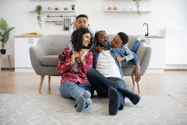 istock Kids talking to parents while staying at home on sunny day 1496893747