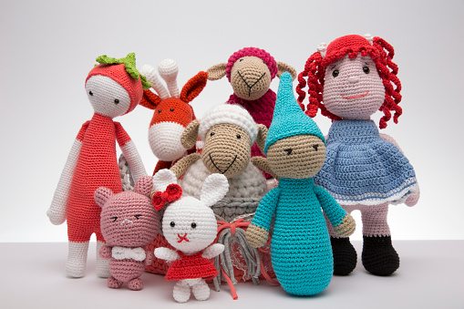 A crochet Amigurumi toys of a of cute stuffed characters.