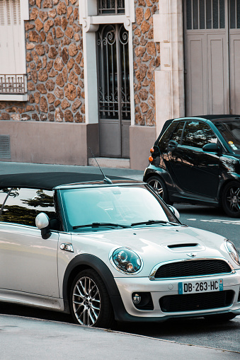 France, Paris - May 18, 2023: White Mini Cooper S Cabrio in the city