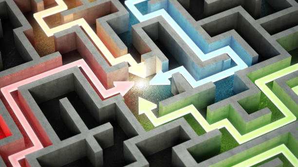 istock Four different colored glowing lines and arrows showing different ways out of the complex maze 1496905831
