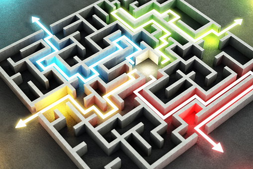 Four different colored glowing lines and arrows showing different ways out of the complex maze.