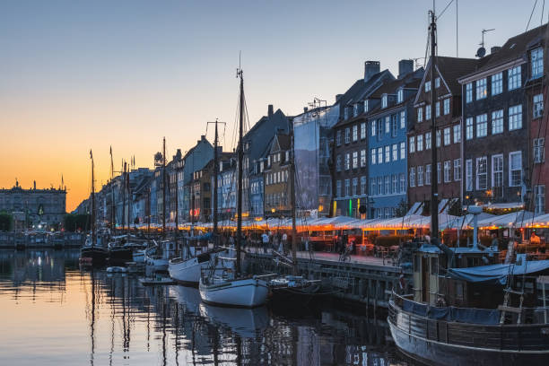 istock beautiful sunset over nyhavn in copenhagen, denmark 1496908321
