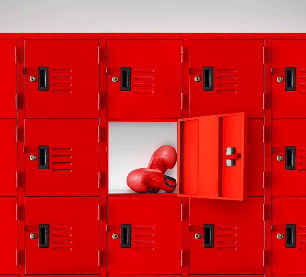 istock boxing gloves in a red locker Inside the gym room 1496911963
