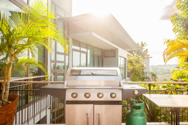 istock Modern luxury patio with a large grill for summer barbecues in a backyard deck 1496918401