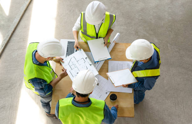 istock top view of engineers team meeting in the building under construction,project manager consultation meeting with coworker 1496923352