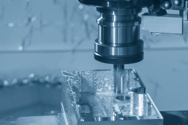 istock The CNC milling machine rough cutting the aluminum housing with flat end mill tool. 1496927388