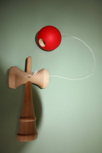 Kendama Kendama is a traditional game from Japan with a background space that can be used as background, template and wallpaper kendama traditional japanese toy stock pictures, royalty-free photos & images