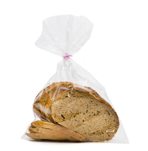 istock closeup bread loaf in plastic bag isolated on white background 1496928581