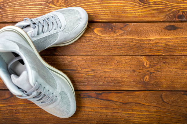 istock Sport shoes on floor 1496932469