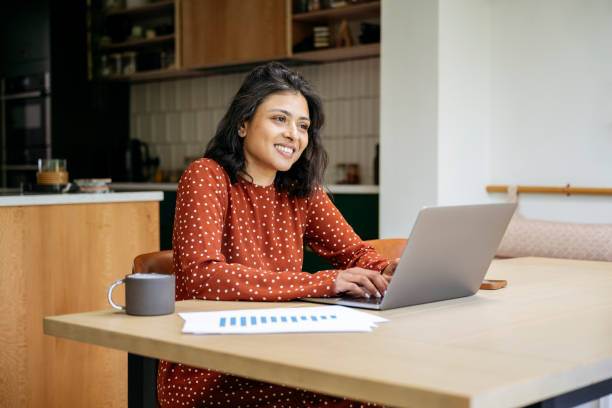 istock Relaxed British Indian professional working at home 1496936287