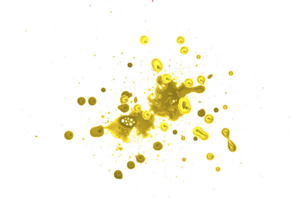 istock closeup drops of golden isolated on white background,abstract pattern 1496936390