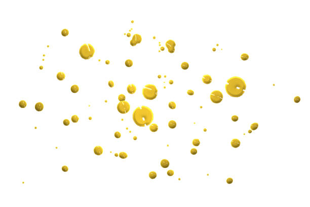 istock closeup drops of golden isolated on white background,abstract pattern 1496936410