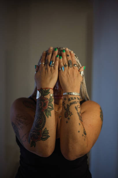 istock Portrait with her Head in her Hands 1496938590