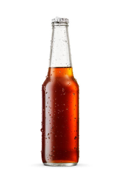 istock Closed wet glass bottle with soft drink cola or soda isolated on white. 1496938669
