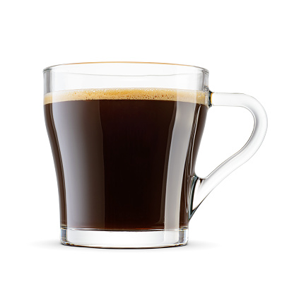 Coffee americano in a transparent glass mug isolated on white background. Classic and elegant coffee beverage.