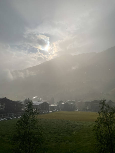 istock Sun and rain at the same time in the European Alps 1496939461