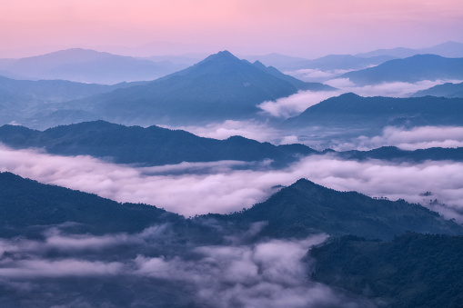 Beautiful nature of hills and mountain are complex with the atmosphere of the morning sunrise, at phu chi dao mountain, Chaingrai province Thailand.