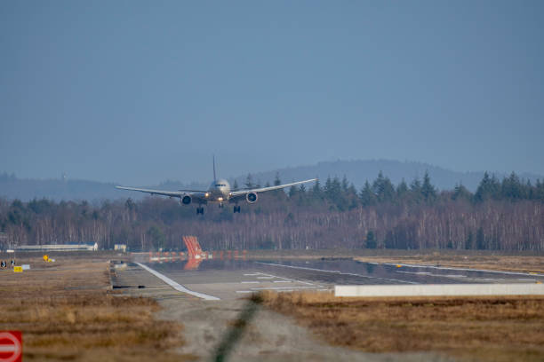 istock Passenger plane approaching the runway at the airport 1496942307