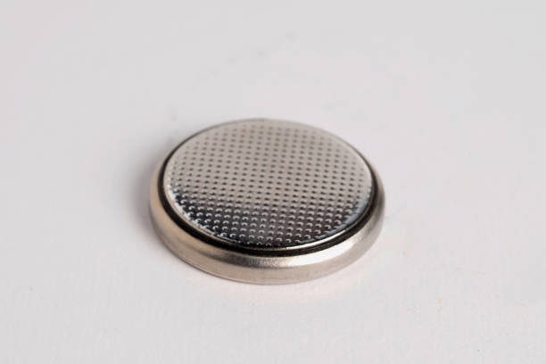 lithium button battery - button battery imagens e fotografias de stock