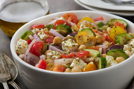 Greek Salad with Feta, Cherry Tomatoes, Cucumber, Olives, Red Onion, Chick Peas and Red Peppers