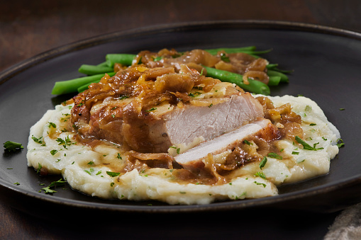 French Onion Boneless Pork Chop with Creamy Mashed Potatoes and Green Beans