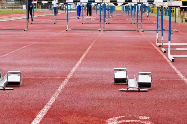 istock Synthetic running track for sporting events with hurdles 1496948601