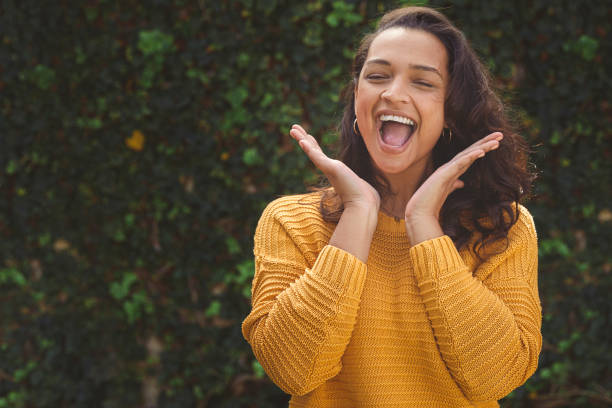 istock Happy woman against greenery 1496951456