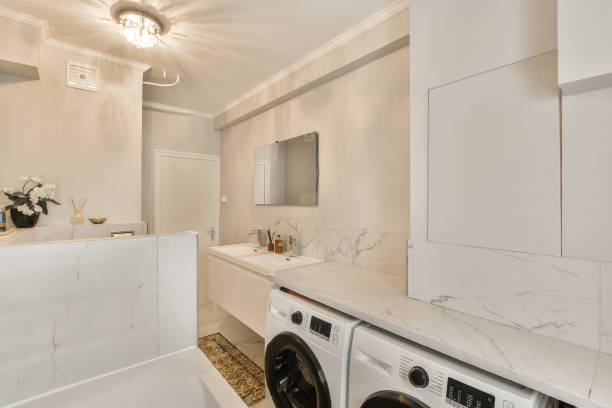 istock a washer and dryer in a laundry room 1496951484