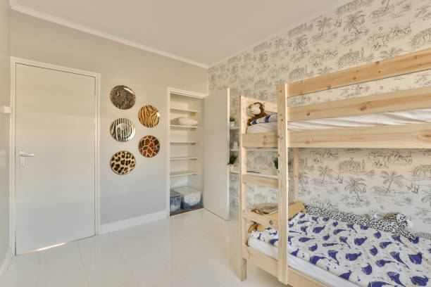 istock a bedroom with bunk beds and a closet 1496951499