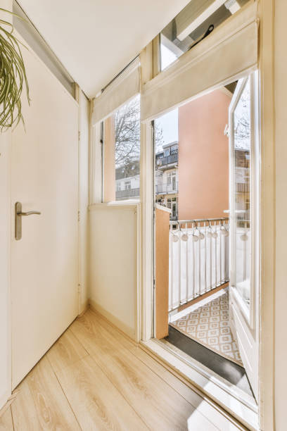 istock a living room with a large window and a door 1496951951