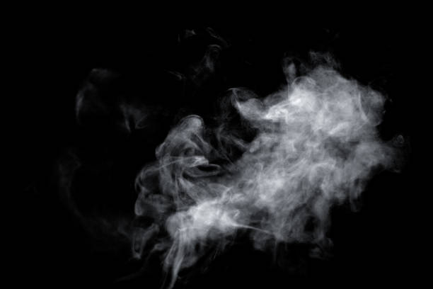 istock isolated smoke, abstract powder, water spray on black background. 1496956941