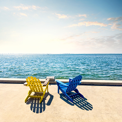 Outdoor chairs by sea in Sarasota, Florida