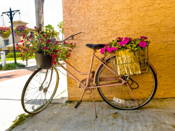 istock Bicycle decorated with flowers at sidewalk 1496960536