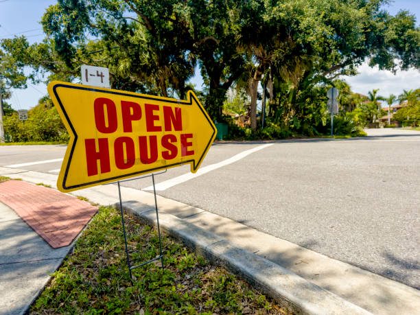 Close up open house sign on sidewalk in Venice, Florida