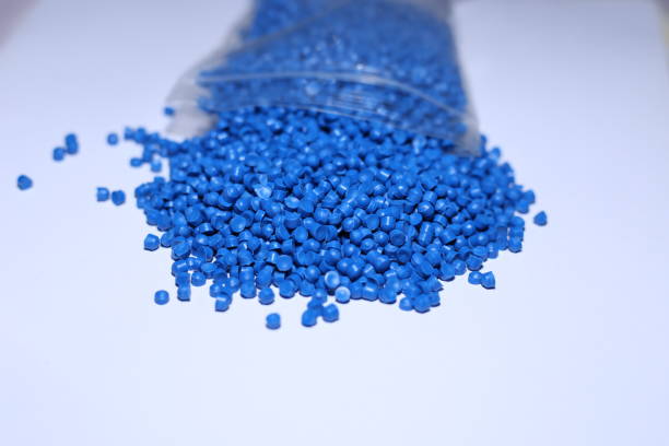 istock Blue of plastic polymer granules on white background. 1496963573