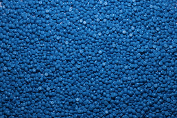 istock Blue of plastic polymer granules for background. 1496963711