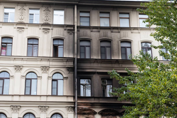 istock Wall of the house with burnt windows 1496967679